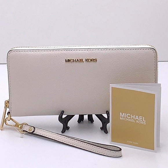 MICHAEL KORS LARGE TRAVEL CONTINENTAL WRISTLET WALLET OPTIC WHITE COLOR - Picture 2 of 16
